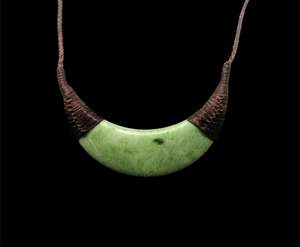 Products: Nz arahura kokopu kopae chest plate 6cm x 2cm - Takutai Rere Jade