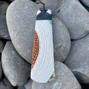 Taonga Jewellery Beef Bone Carvings: Toki Pacific