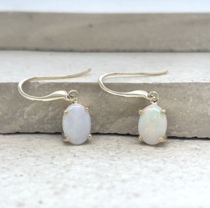 Opal: Opal 9ct Yellow Gold Hook Oval Drop Earrings