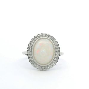 Opal: Opal & Diamond 9ct White Gold Halo Ring