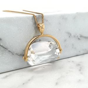 Quartz: Clear Quartz 9k Yellow Gold Spinner Pendant