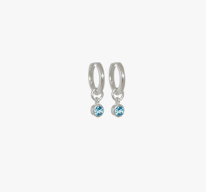 Evolve Sterling Silver December Topaz Huggie Earrings