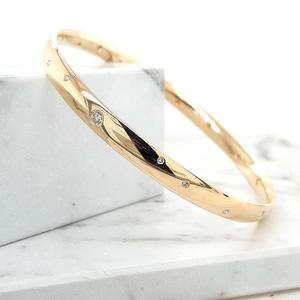 Gold Bangles: 9ct Yellow Gold Sharp Oval Profile 6mm x 2.15mm Diamond Set Bangle