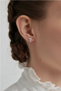 Gift Guide Under 150: Karen Walker Sterling Silver Mini Bow Stud Earrings