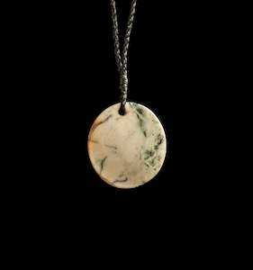Necklaces: Jade disc pendant by Nick and Mady