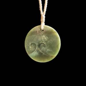 Exhibition Gallery: Jade disc pendant with korus by Nick and Mady