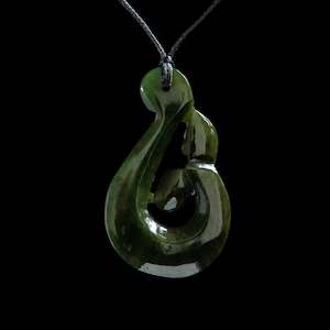 Tamaki Carvers 1: Hei Matau Whale Tail handcrafted jade pendant