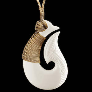 Bound Engraved Matau, handcrafted bone pendant