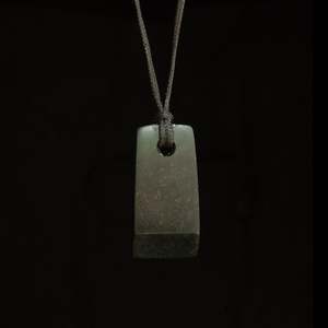 Toki Adze: Hand carved Hei Toki bowenite pendant by Nick and Mady