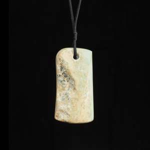 Toki Adze: Hei Toki hand carved jade pendant by Nick and Mady