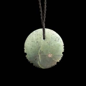 Jade disc pendant by Nick and Mady