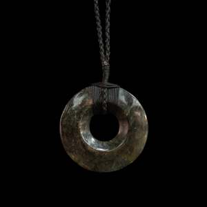 Orphaned: Kopae, Pi Disc handcrafted jade pendant by Alex Sands