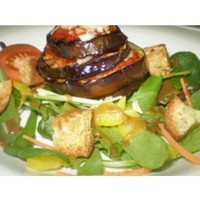Products: Chargrilled Aubergine Stack with Rich Tomato Sauce and Shaved Parmesan Served on a Fresh Garden Salad