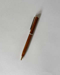 Stationary Books: Native Wood Pen Rimu - Brass Trim Slim