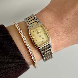 Latest Highlights: Omega De Ville "America" Rectangular Octo Women's Watch - B