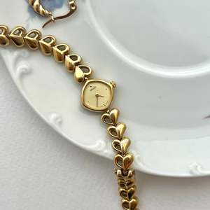 Seiko Gold Toned Women's Watch with Hearts Bracelet