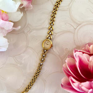 Bridal Watches: Seiko Ladies Gold Tennis Bracelet Watch with Diamond Accents and Champagne Dial