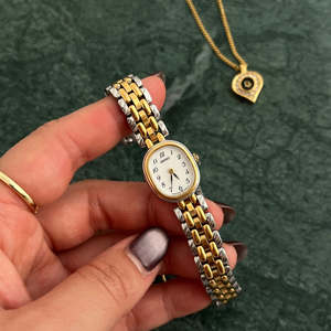 Birth Year Watches 1990: Seiko Gold Petite Oval Watch with Ivory Enamel Dial