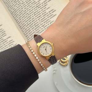 Seiko Gold Toned Sculpted Woman's Watch