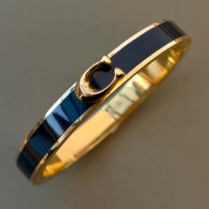 Coach Black Bangle with a "C" Logo