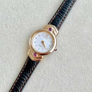 Citizen Gold Toned Women's Watch with Purple Stone