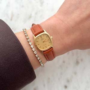 Omega Ladies Watches: Omega De Ville Gold Tone Cushioned Square Women's Watch