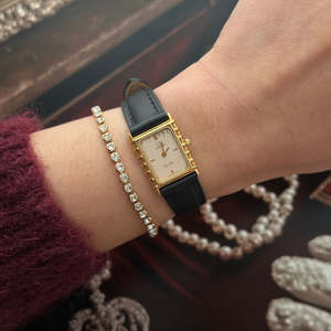 Omega Ladies Watches: Omega De Ville Gold Women’s Watch with Patterned Champagne Dial