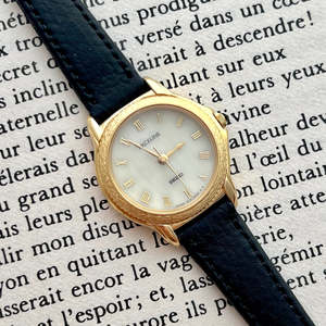 The Heirloom Collection: Seiko Exceline Golden Roman Mother of Pearl Woman's Watch