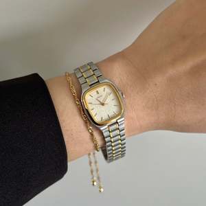 Seiko Soft Rectangular Two Toned Woman's Watch with Linen Textured Dial