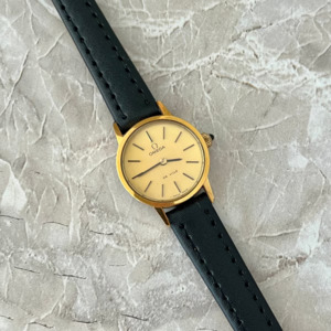 Omega De Ville Gold Tone Round Champagne Dial Women's Watch