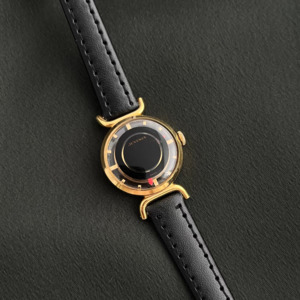 Juvenia Mystere Mystery Dial Gold Tone Strap Watch