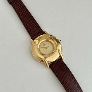 Latest Arrivals: Fendi Champagne Dial Gold Tone Sculpted Strap Watch