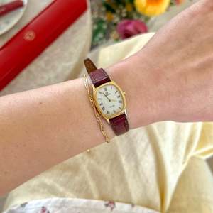 Omega De Ville Gold Tone Oval Roman Red Strap Watch