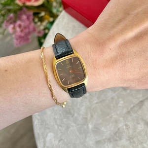 Omega De Ville Onyx Dial Gold Tone Strap Watch