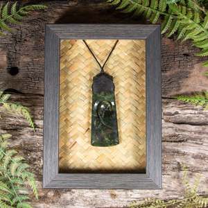 Pounamu Sculptures Touchstones: NZ Greenstone Framed Toki with Koru Pendant (CA514) Kawakawa Pounamu