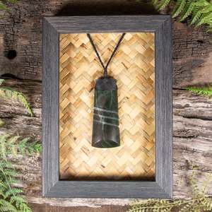 Pounamu Sculptures Touchstones: NZ Greenstone Framed Toki Pendant (CA513) Kawakawa Pounamu
