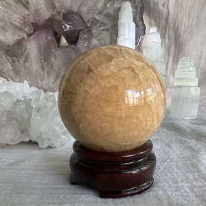 Orange calcite sphere - The Hidden Gem