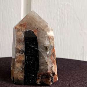 Black tourmaline and peach moonstone in quartz tower - The Hidden Gem