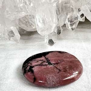 Products: Rhodonite palmstone - The Hidden Gem