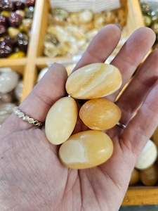 Abundance: Orange Calcite Tumbles