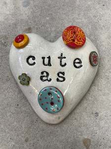 Cute as a button wall heart.