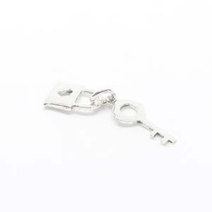 Lock and Key Silver Charm