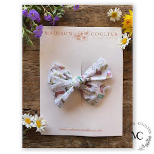 Madison Coulter Fine Arts: Pinwheel Bow Hair Clip by Madison Coulter