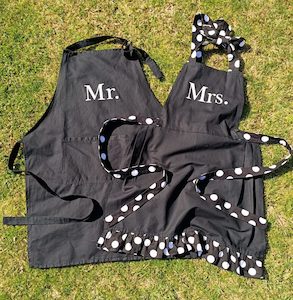 Mr & Mrs Aprons Hire - The Party Godmother