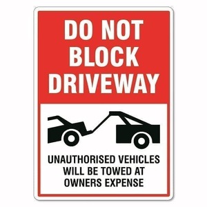 Do Not Block Driveway Tow Away Sign