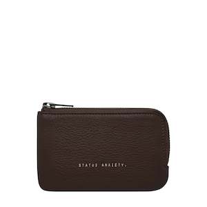 Wallets And Clutches: Left Behind by Status Anxiety - Cocoa