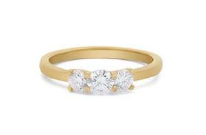 Three Stone Engagement Rings: Petite: Brilliant Cut Diamond Three Stone Ring