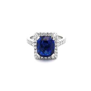 Blue Sapphire and Diamond Halo Ring in Platinum | 4.59ct