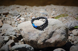 Products: Blue Hematite Arrows Lava Stone Bracelet - Think Eco