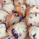 Sweet Scone Half topped with jam and whipped cream